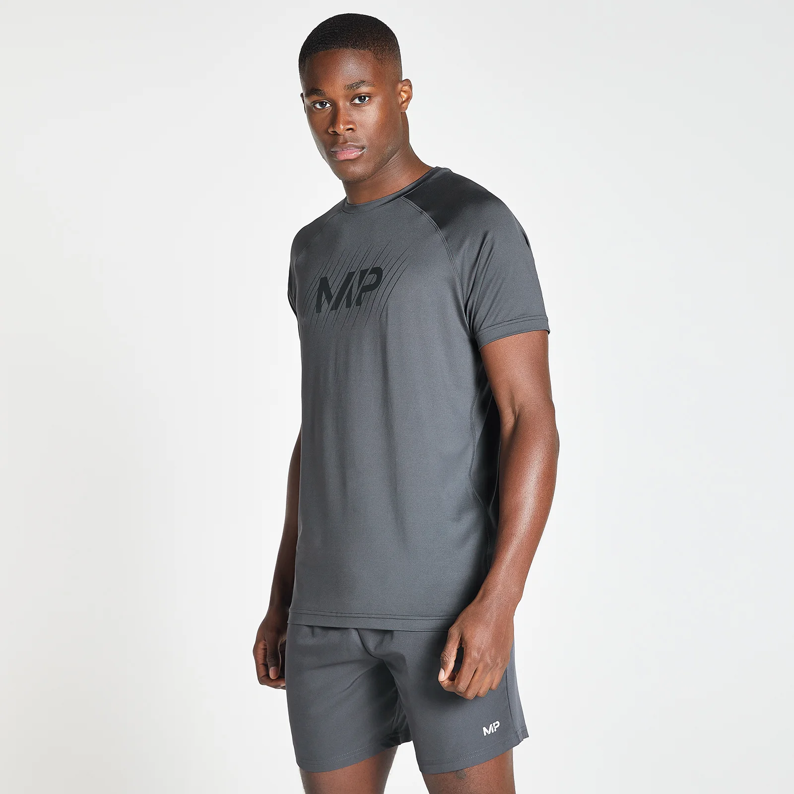 MP Men's Linear Line Graphic Essentials Training Short Sleeve T-Shirt - Gun Metal - XXS Immagine 1