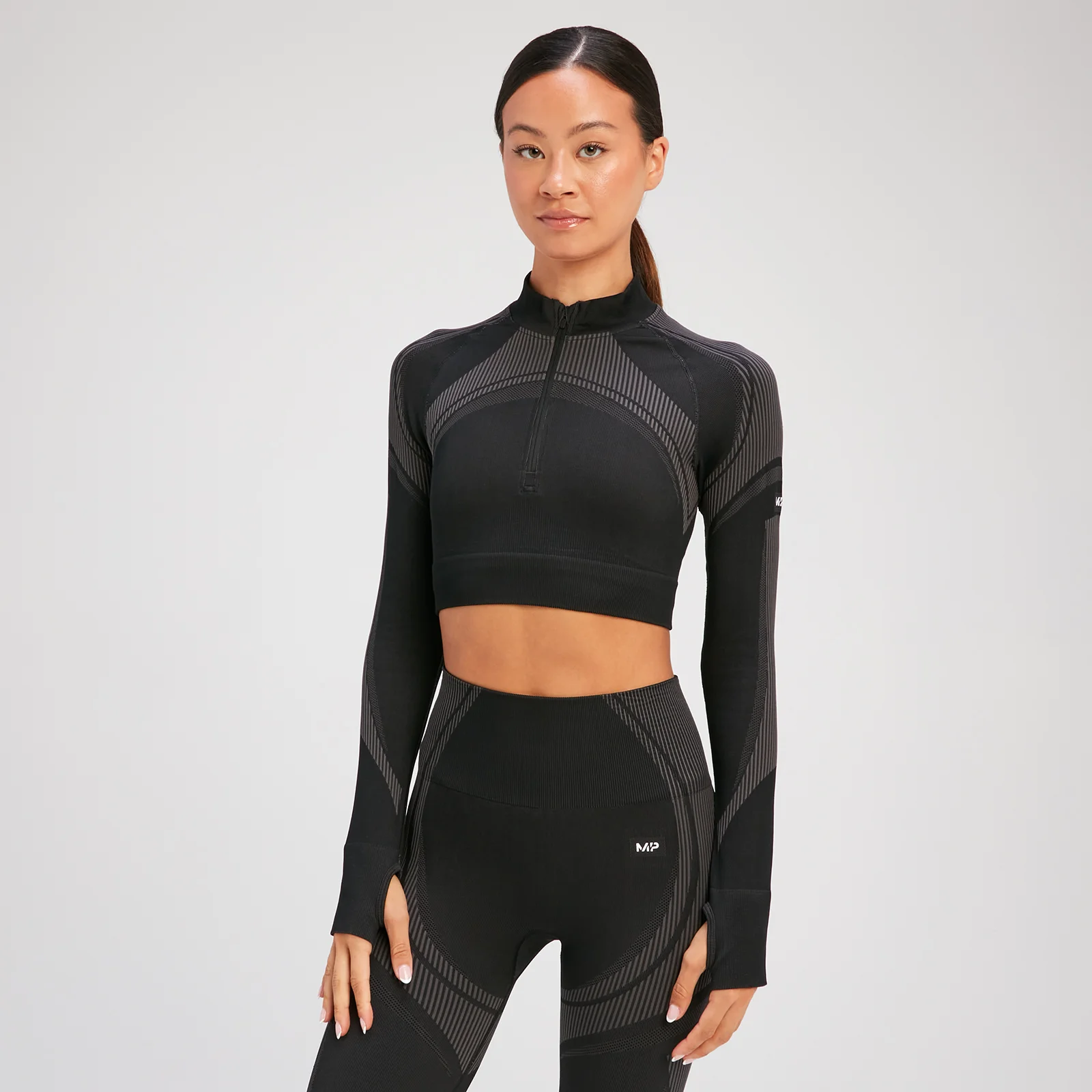 Maglia cropped a maniche lunghe senza cuciture con cerniera 1/4 MP Tempo Ultra da donna - Nera - XS Immagine 1