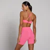 Reggiseno sportivo donna MP Tempo con schiena intrecciata - Rosa vibrante